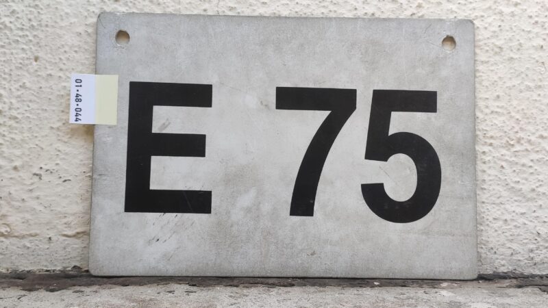 E 75